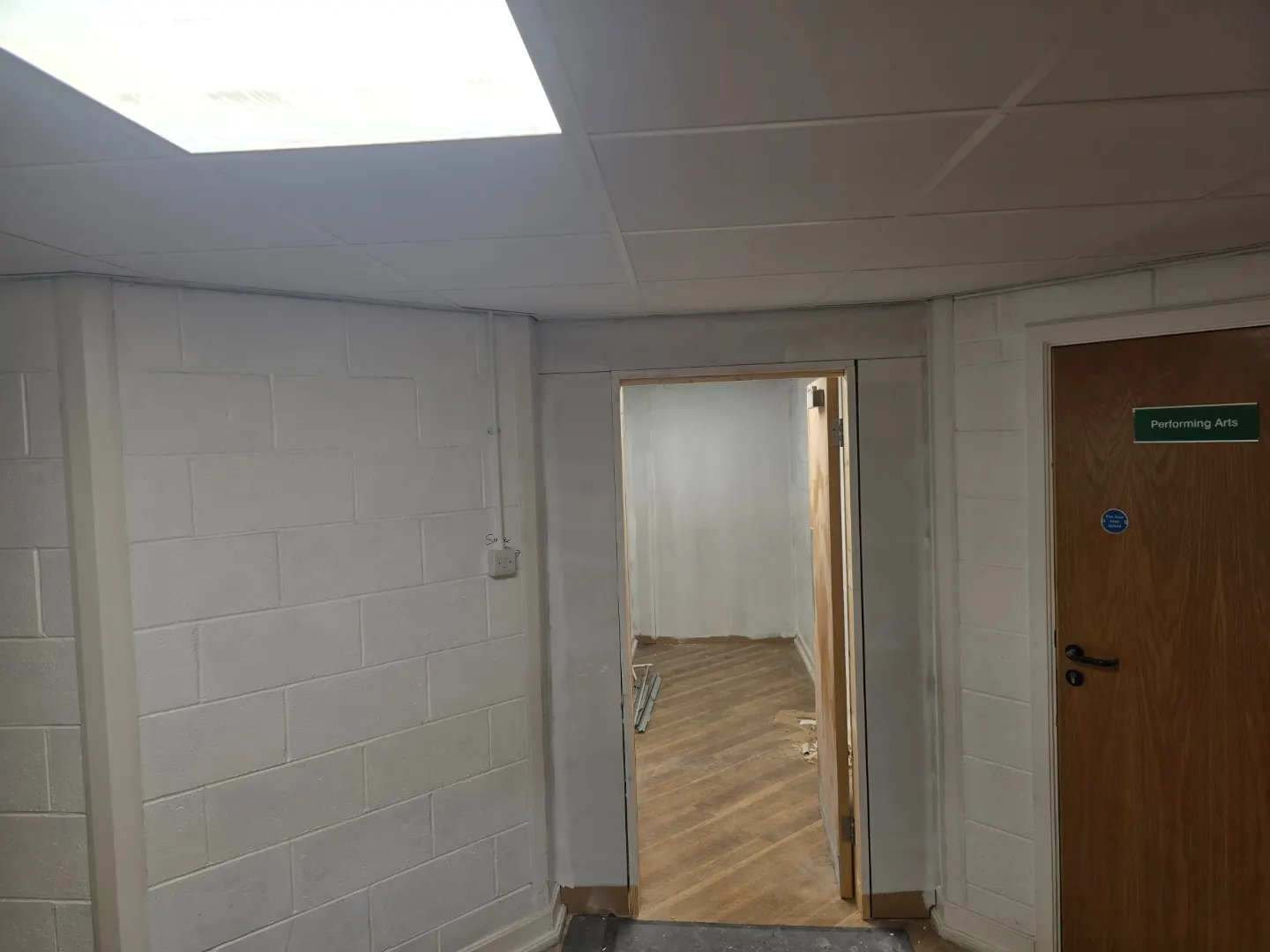 New doorway formed, lined and decorated within a school building.