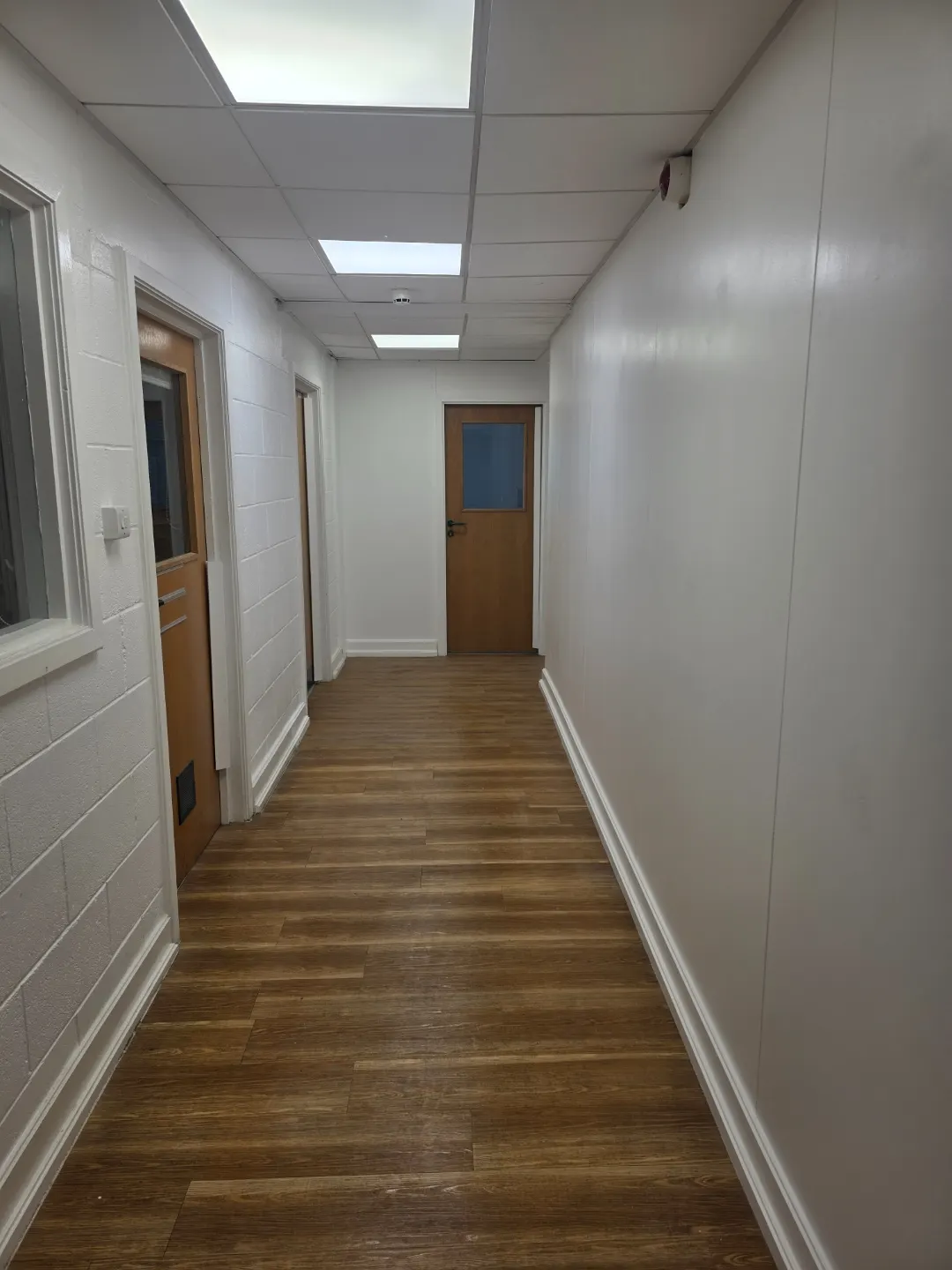 School corridor with new LVT flooring and decoration completed.